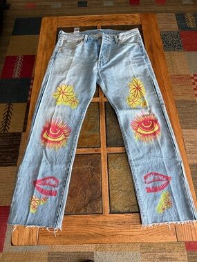 Levi's Light Wash Jeans with Pink Graphic Groovy Text
